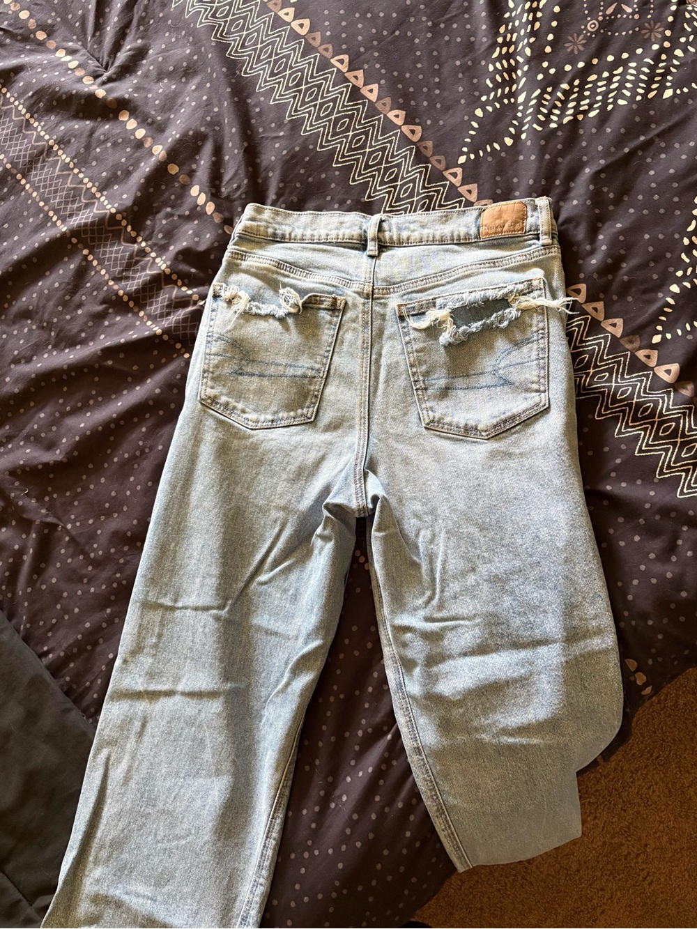 American Eagle Outfitters Light Blue High-Rise Distressed Back Pocket Jeans